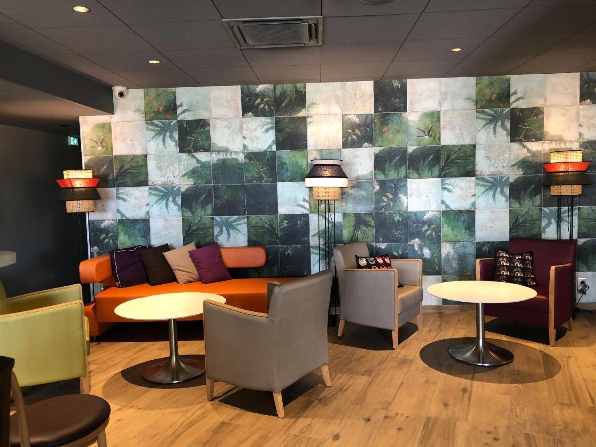 Готель Ibis Styles Clermont-Ferrand Aeroport Екстер'єр фото