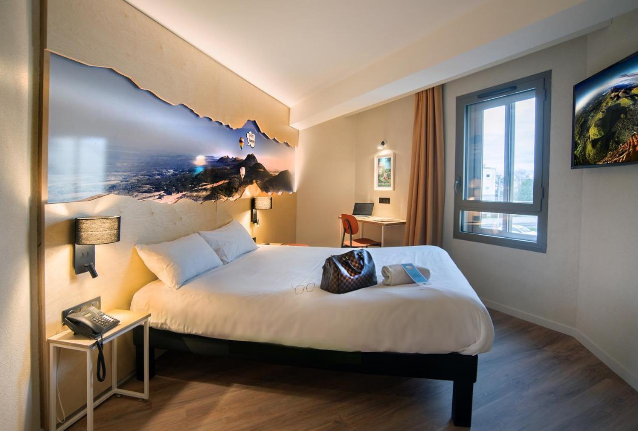 Готель Ibis Styles Clermont-Ferrand Aeroport Екстер'єр фото